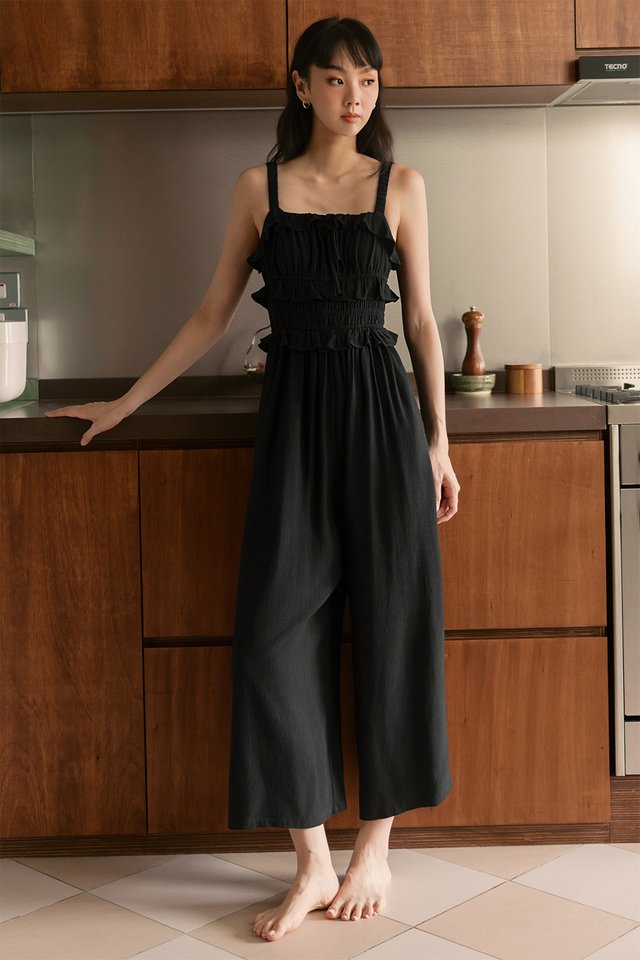 PORTO RUFFLE LINEN JUMPSUIT IN BLACK